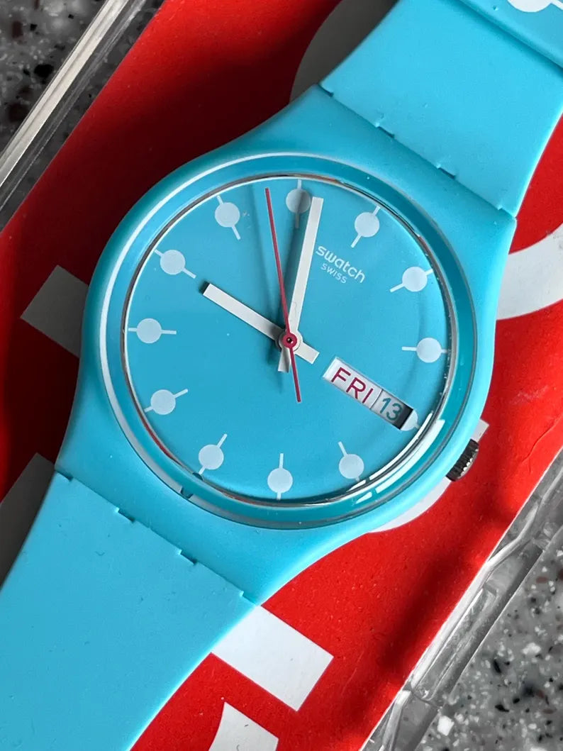 Swatch Watch Blue day date feature NEW Venice Beach Swatch Watch 34mm unworn in original box great silicone everyday band turquoise color